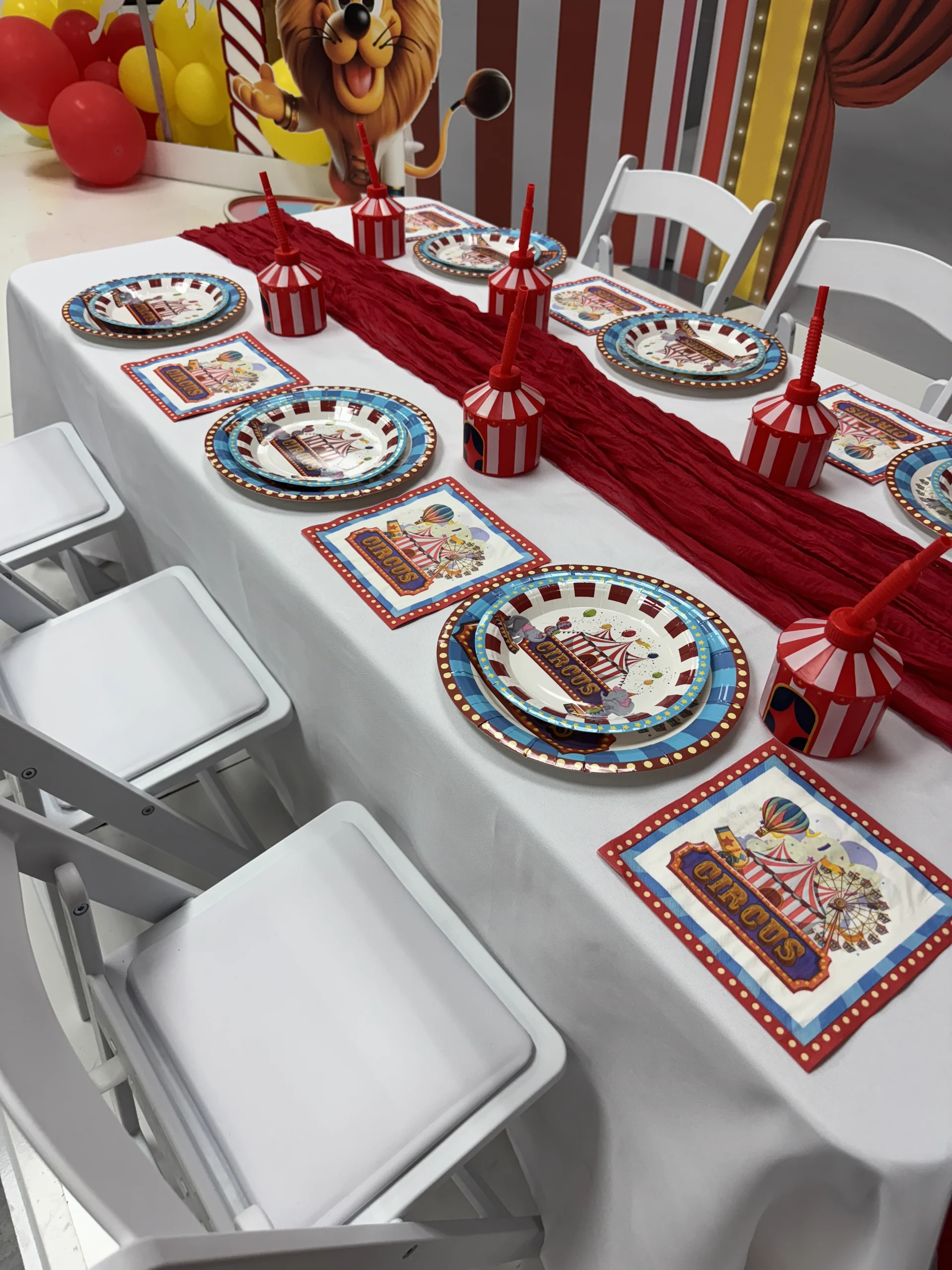 Children's low tables and pastel chairs party decor